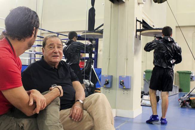 Bob Arum sits for an interview with ESPN The Magazine writer Tim Struby during an undercard workout the morning of Tuesday, Nov. 19, 2013, at Venetian Macau.