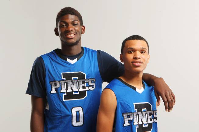 Desert Pines basketball players, from left, Re'Meake Keith and Coby Myles Thursday, Nov. 21, 2013.