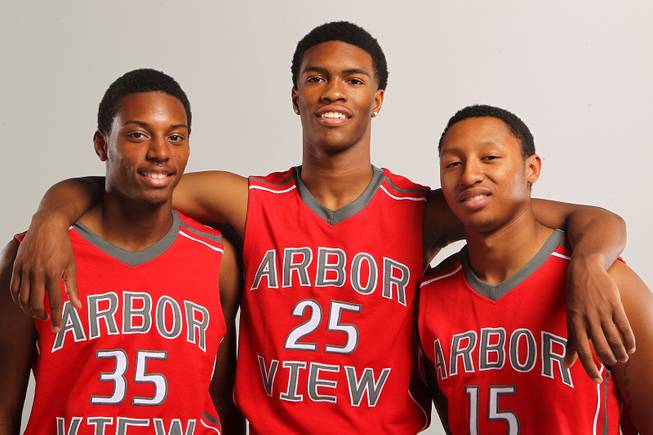 Arbor View basketball players, from left, Terrell Butler, Justin Burks and Charles Porter Thursday, Nov. 21, 2013.