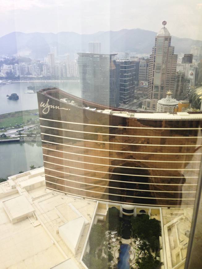 A look down from an Encore Grand Salon Suite to the roof of neighboring Wynn Macau.