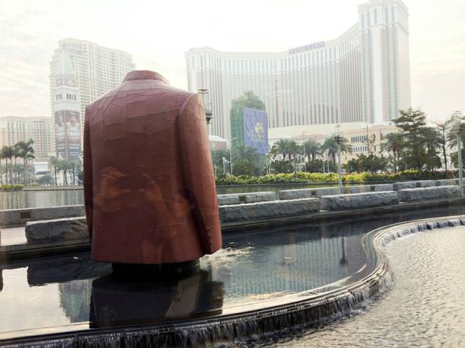 The giant, metal Mao suit at Fragrant Harbor at City of Dreams in Macau.