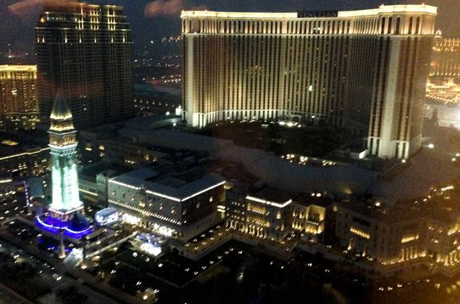 A nightfall view of Venetian Macau from a Crown Towers suite
