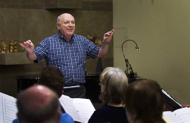 Myron Heaton conducts the Myron Heaton Chorale during a rehearsal at Christ the Servant Lutheran Church in Henderson Tuesday, Nov. 26, 2013. The Chorale are scheduled to perform at the church on Dec. 8.