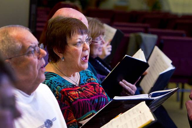 Debbie Hardin, center, and members of the Myron Heaton Chorale rehearse at Christ the Servant Lutheran Church in Henderson on Tuesday, Nov. 26, 2013. The chorale is scheduled to perform at the church Dec. 8.