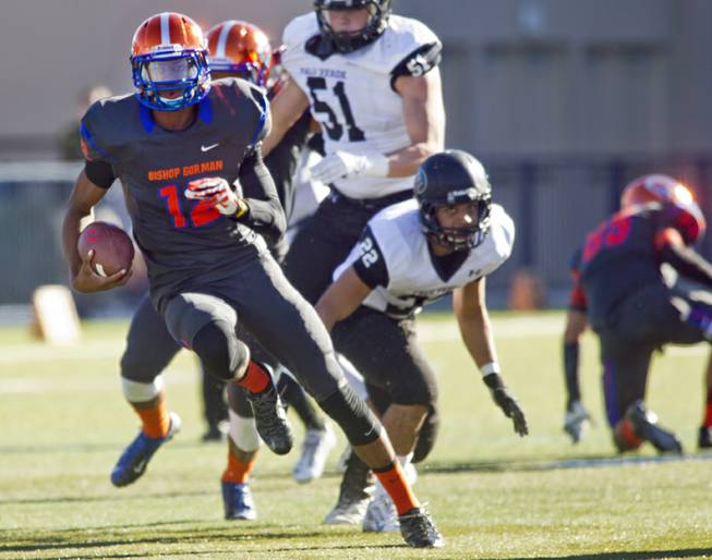 Bishop Gorman QB Randall Cunnigham II breaks loose for his first touchdown of the game against Palo Verde on Saturday, Nov. 30, 2013.
