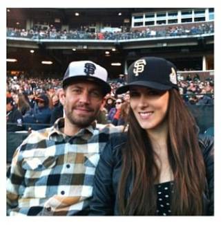 Pual Walker and Aubrianna Atwell at a San Francisco Giants game in April 2013.