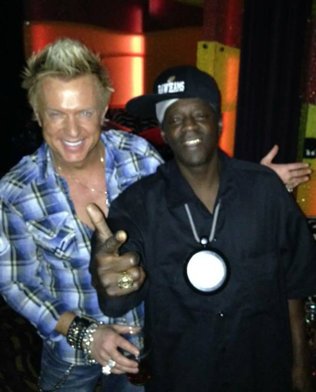 Chris Phillips of Zowie Bowie and Flavor Flav throw it down at Rocks Lounge.