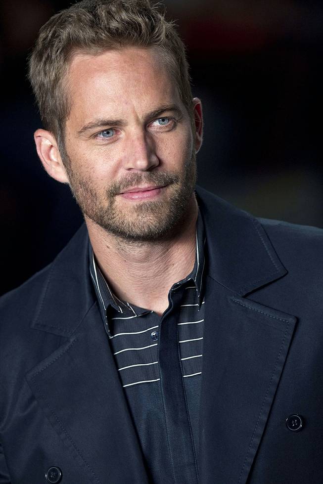 Actor Paul Walker is shown wearing a creation from the Colcci summer collection at Sao Paulo Fashion Week in Sao Paulo, Brazil, March 21, 2013.