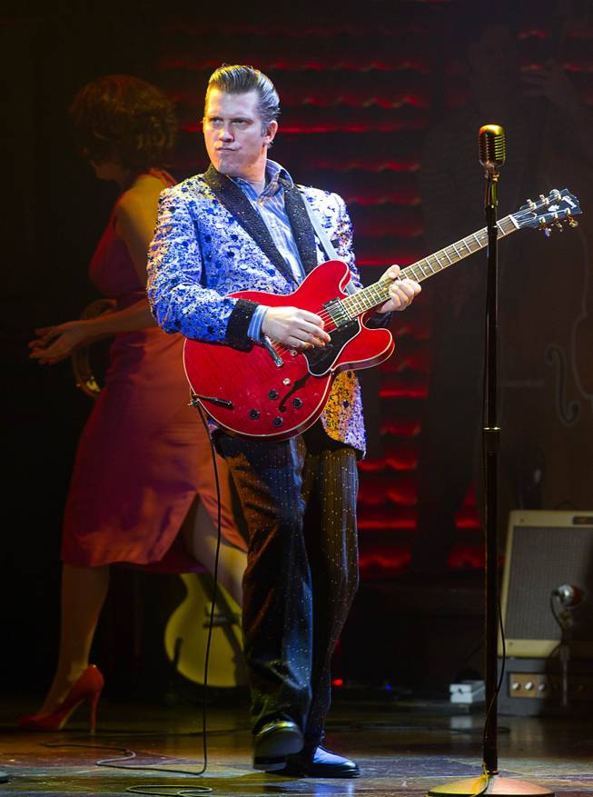 Robert Britton Lyons performs as Carl Perkins during "Million Dollar Quartet" at Harrah's Wednesday, Dec. 4, 2013.  Madison performed "The Lady Loves Me" with Elvis (Justin Shandor).