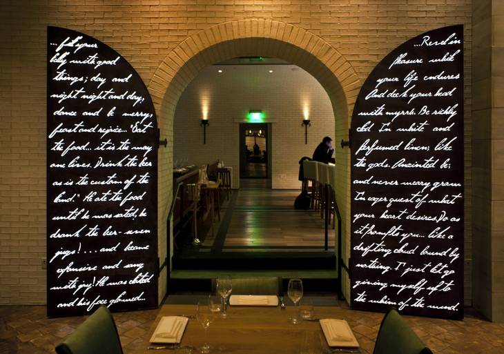 Laser-cut steel doors with illuminated lettering are a distinctive feature at the new restaurant Crush in MGM Grand pictured here on Friday, Dec. 6, 2013.