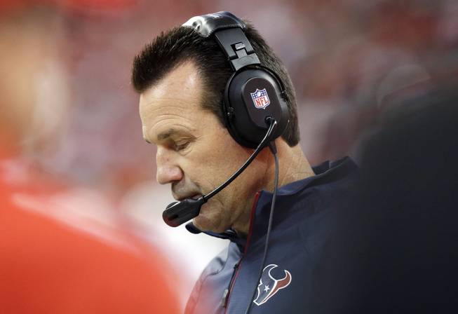 In this Nov. 3, 2013, file photo, Houston Texans head coach Gary Kubiak watches from the sidelines during the first quarter of an NFL football game against the Indianapolis Colts, in Houston.