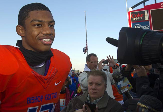 Bishop Gorman High School quarterback Randall Cunningham Jr. talks with reporters after the team defeated Reed High School of Sparks, Nev. in the Division I state high school football championship game at Sam Boyd Stadium Saturday, Dec. 7, 2013.