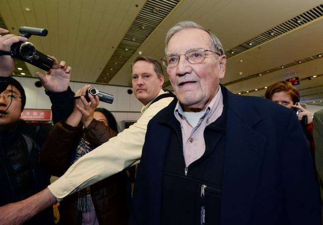 U.S. tourist Merrill Newman arrives at Beijing's airport Saturday, Dec. 7, 2013, after being released by North Korea. North Korea deported Newman, who was detained for more than a month.
