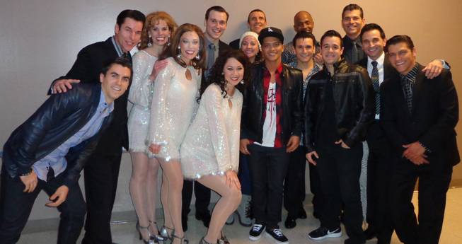 Bruno Mars, in the L.A. Dodgers cap, with cast members of "Jersey Boys" on Thursday, Dec. 5, 2013, at Paris Las Vegas.