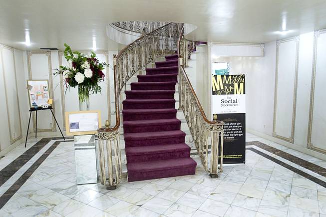 A staircase to the second floor is shown during an open house and book signing at the Liberace house Monday, Dec. 9, 2013.  Liberace's former residence was purchased by British businessman Martyn J. Ravenhill for $500,000 in August.
