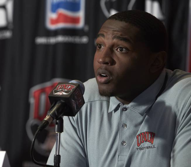 UNLV senior defensive tackle Tyler Gaston answers questions about the Heart of Dallas Bowl at the Rebels' press conference on Monday, Dec. 9, 2013.