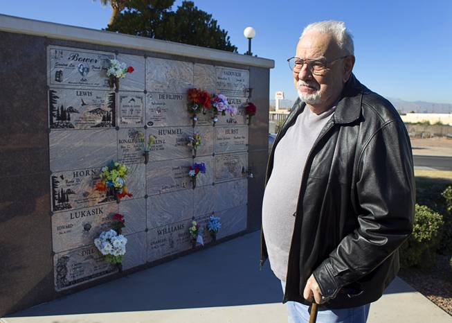 Frank Bower stands by an ashes wall at Palm Boulder Highway Mortuary & Cemetery in Henderson Wednesday, Dec. 11, 2013. After his wife Sandra Lee died in 2011, he had a portion of her ashes sent into space.