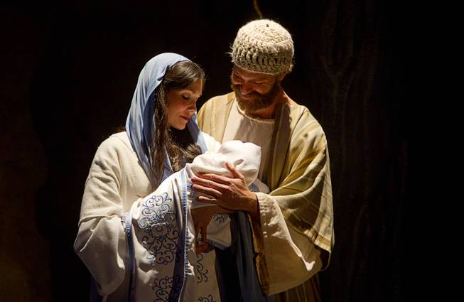 Katherine and Kam Brian portray Mary and Joseph during the Nativity, a live nativity performance, at Opportunity Village Englestad Campus, 6050 S. Buffalo Drive, Wednesday, Dec. 11, 2013. The free performances are at 6 p.m. and 7 p.m. on Thursday with the 7 p.m. show in Spanish. On Friday and Saturday there is an additional performance at 8 p.m. The production is put on by the Red Rock Stake of the Church of Latter-day Saints.
