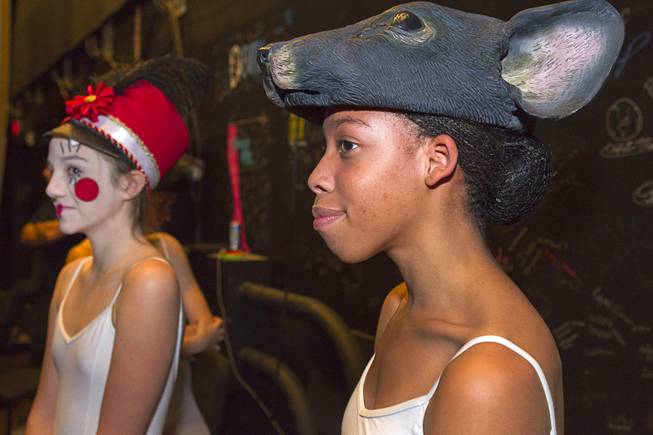 Toy solder Sydney Carrigan, 12, and mouse Jahisha Williams, 16, wait backstage during rehearsal for Nevada Ballet Theater’s “The Nutcracker” at the Smith Center for the Performing Arts on Wednesday, Dec. 11, 2013. The annual performance opens Saturday and runs through Dec. 22.
