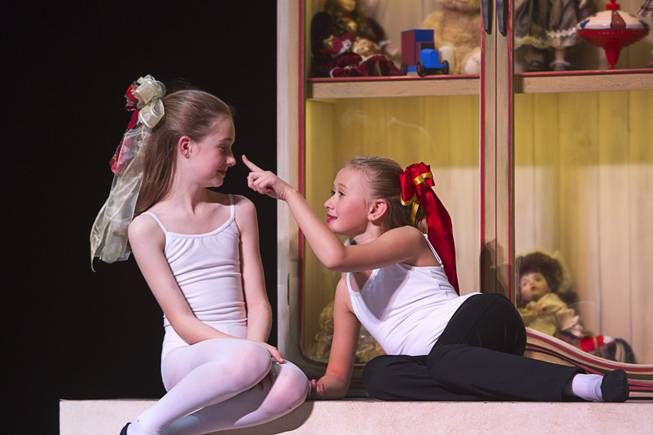 Party scene girls Isabella Moeslacher and Erin Chitren take a break during a rehearsal for Nevada Ballet Theater’s “The Nutcracker” at the Smith Center for the Performing Arts on Wednesday, Dec. 11, 2013. The annual performance opens Saturday and runs through Dec. 22.
