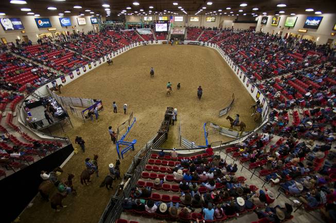 Rodeo fans fill the stands to watch the XIII World Series of Team Roping (WSTR) Finals at the South Point Hotel Wednesday, Dec. 11, 2013.