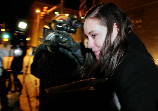 Jordan Graham leaves the Federal Courthouse in Missoula, Mont., Monday, Dec. 9, 2013, after the first day of her murder trial. 