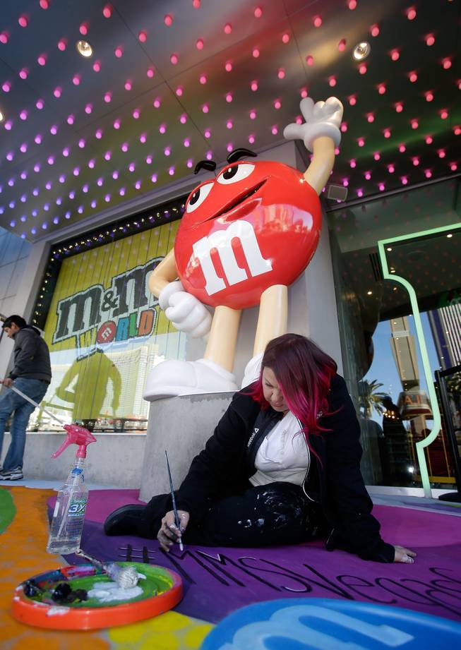 M&M'S World Las Vegas celebrates opening of world's largest candy wall with a 3-D chalk art reproduction by the We Talk Chalk art group on December 13, 2013 in Las Vegas, Nevada.