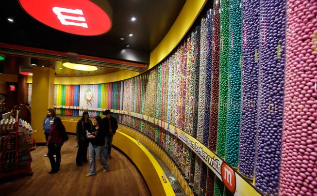 M&M'S World Las Vegas celebrates the opening of its new candy wall - the largest M&M'S candy wall in the world - as part of a larger full-store renovation project on December 13, 2013 in Las Vegas, Nevada. The candy wall stretches more than 62 feet wide and features 125 tubes of M&M'S in 22 colors and 11 varieties.