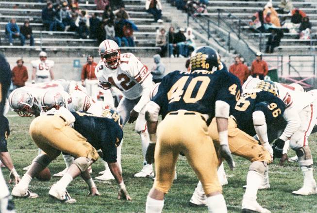 Quarterback Randall Cunningham at the line of scrimmage during the UNLV football team's California Bowl victory against Toledo in 1984.