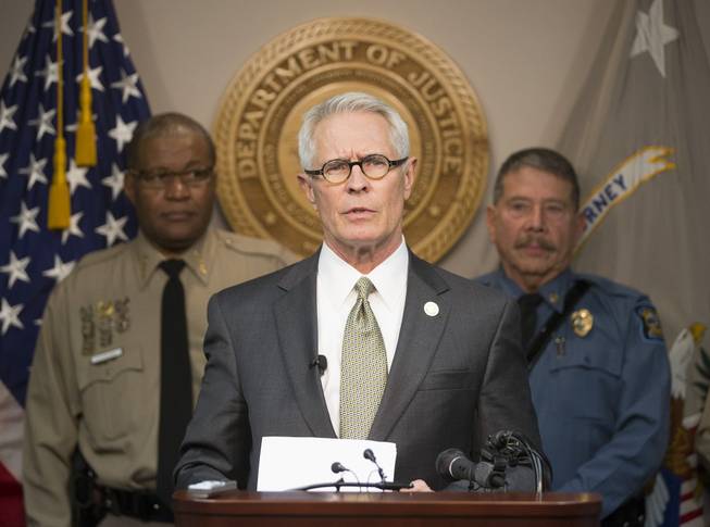 U.S. Attorney Barry Grissom announces the arrest of Terry Lee Loewen, 58, of Wichita, Kan., during a news conference on Friday, Dec. 13, 2013, in Witchita, Kan. Grissom said Loewen was arrested Friday morning at Mid-Continent regional airport where he planned to drive a car that he believed was full of explosives into a terminal at the airport.