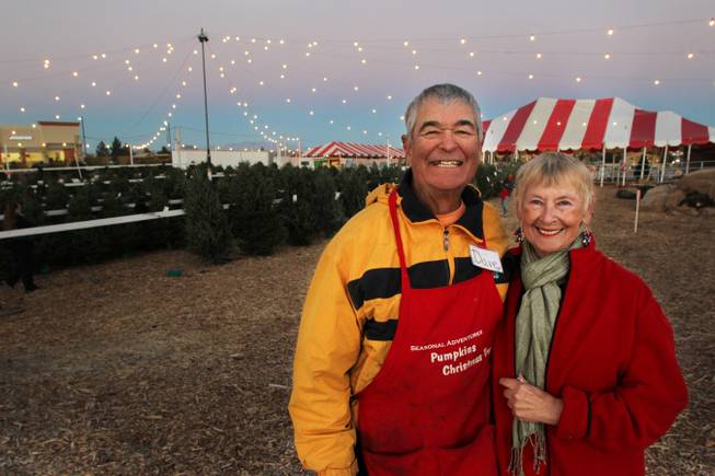 Dave and Patty Riley, managers of the Stu Miller's Seasonal Adventures Christmas tree lot on Stephanie Street, are seen Saturday, Dec. 14, 2013.