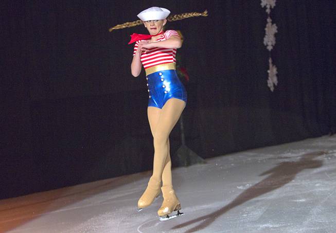 Katie Freter performs during the "Treasure of Christmas" holiday ice show at the Sobe Ice Arena at the Fiesta Rancho Sunday, Dec. 15, 2013. The annual program features local skaters. Admission was free with a donation of three canned goods which will be donated to the Salvation Army, organizers said.