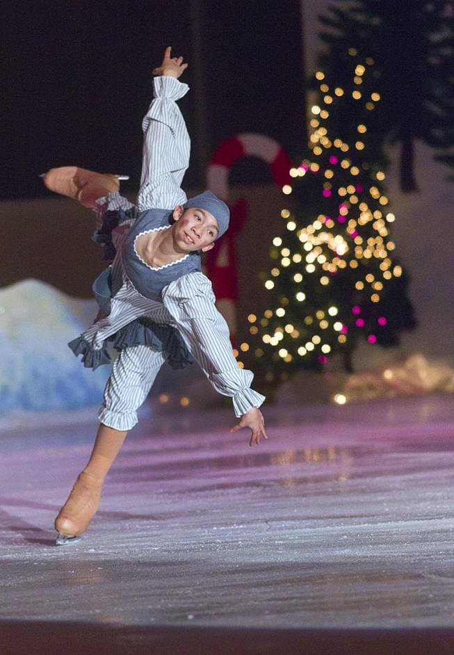 Taylor Campbell performs during "Treasure of Christmas" holiday ice show at the Sobe Ice Arena at the Fiesta Rancho Sunday, Dec. 15, 2013. The annual program features local skaters. Admission was free with a donation of three canned goods which will be donated to the Salvation Army, organizers said.