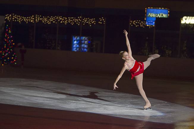 Kimberlee Hyp performs during "Treasure of Christmas" holiday ice show at the Sobe Ice Arena at the Fiesta Rancho Sunday, Dec. 15, 2013. The annual program features local skaters. Admission was free with a donation of three canned goods which will be donated to the Salvation Army, organizers said.
