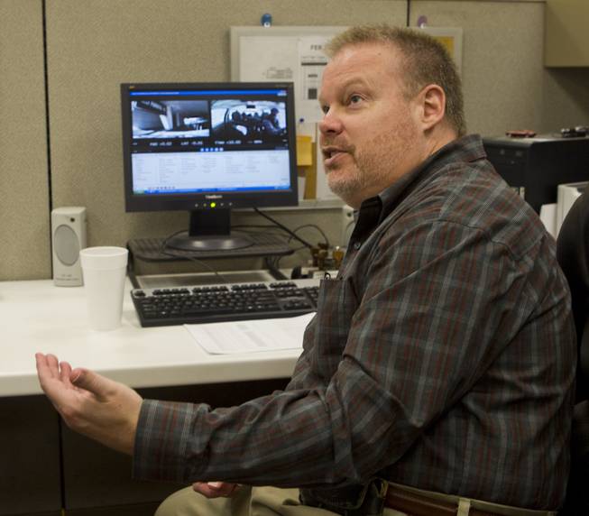 Drive Cam Analyst Rick Elmore views and evaluates each incident video from drivers at Yellow Checker Star on determines what course of action is needed to improve their skills Monday, Dec. 16, 2013.