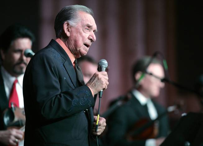 Country Music Hall of Fame member and Grammy award winner Ray “The Cherokee Cowboy” Price celebrates his 86th birthday by performing in this photo from, Jan. 7, 2011,  in Bullard, Texas. 