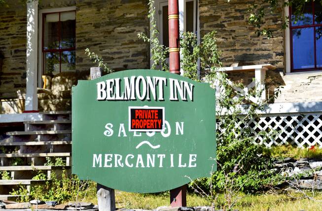 A private property sign is tacked to the front of the Belmont Inn and Saloon, which is closed to the public as the owner determines whether to further pursue government permits.