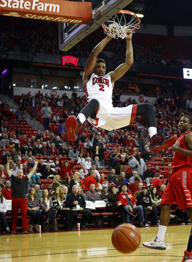 UNLV Runnin' Rebel Khem Birch dunks the ball during the first game of the Continental Tire Las Vegas Classic against the Radford University Highlanders at the Thomas & Mack Center Wednesday, Dec. 18, 2013.