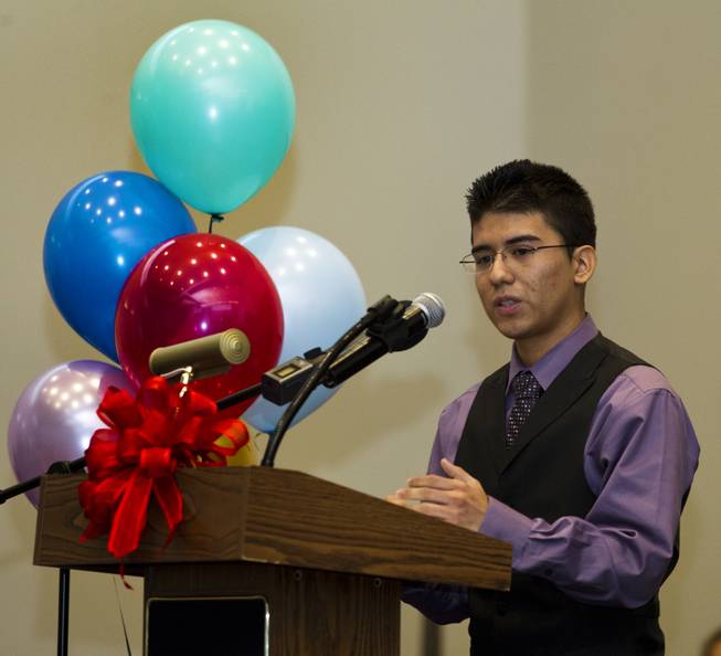 Northwest Career & Technical Academy student Josue Mendoza-Garcia tells a story about the impact teacher Jeff Hinton has had on his education during the Nevada Teacher of the Year Award ceremony on Wednesday, Dec. 18, 2013.