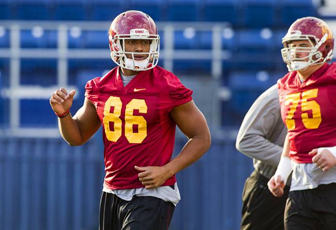 USC tight end and Bishop Gorman graduate Xavier Grimble, left, practices with the team at Bishop Gorman Thursday, Dec. 19, 2013. USC plays Fresno State in Saturday's Las Vegas Bowl.