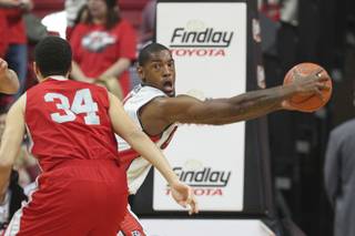 UNLV forward Roscoe Smith holds a rebound away from Sacred Heart during their game Friday, Dec. 20, 2013 at the Thomas & Mack Center.
