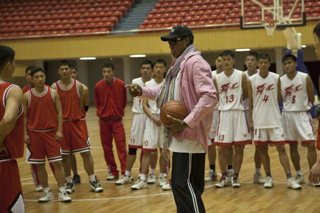 Former NBA basketball star Dennis Rodman speaks to North Korean basketball players during a practice session in Pyongyang, North Korea on Friday, Dec. 20, 2013. During the session, Rodman selected the members of the North Korean team who will play in Pyongyang against visiting NBA stars on Jan. 8, 2014, the birthday of North Korean leader Kim Jong Un.