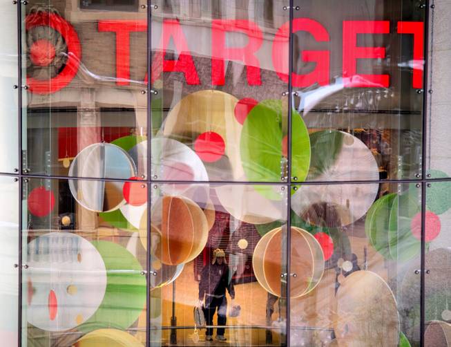 This Dec. 19, 2013, photo shows a Target store near Target headquarters in Minneapolis. Target says that about 40 million credit and debit card accounts customers may have been affected by a data breach that occurred at its U.S. stores between Nov. 27 and Dec. 15. 