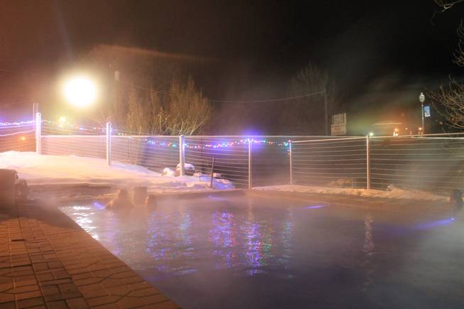 Steam rises from a pool at the Lava Hot Springs Inn on Saturday, Dec. 21, 2013.