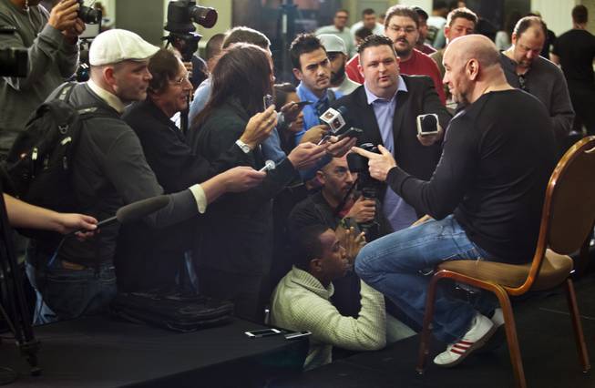 UFC president Dana White talks to reporters following a press conference for the upcoming UFC168 at the MGM Grand Hotel & Casino with commentary from the top fighters on the card Thursday, Dec. 26, 2013.