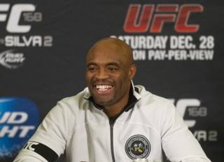 Anderson Silva reacts to a reporter's question during a press conference for the upcoming UFC168 at the MGM Grand Hotel & Casino with commentary from the top fighters on the card Thursday, Dec. 26, 2013.
