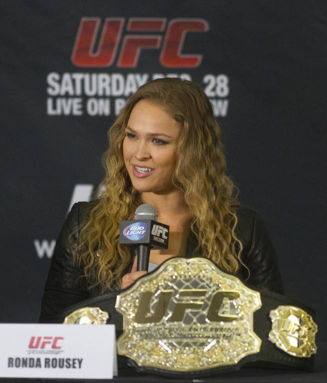 Ronda Rousey responds to a reporter's question during a press conference for the upcoming UFC168 at the MGM Grand Hotel & Casino with commentary from the top fighters on the card Thursday, Dec. 26, 2013.