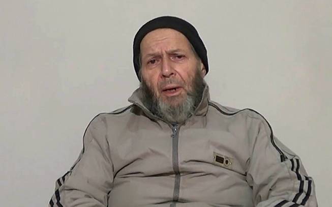 This image made from video released anonymously to reporters in Pakistan, including the Associated Press on Thursday, Dec. 26, 2013, which is consistent with other AP reporting, shows Warren Weinstein, a 72-year-old American development worker who was kidnapped in Pakistan by al-Qaida more than two years ago, appealing to President Obama to negotiate his release.
