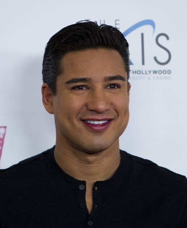 Mario Lopez arrives at the red carpet for the grand opening of Britney Spears’ “Britney: Piece of Me” at Planet Hollywood on Friday, Dec. 27, 2013, in Las Vegas.