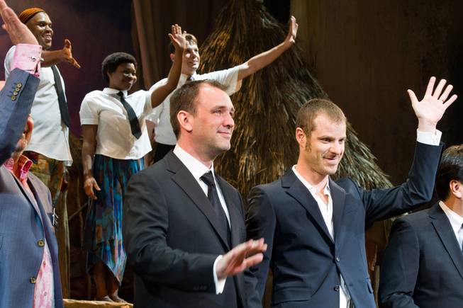 Trey Parker and Matt Stone appear at the curtain call for the opening-night performance of their Broadway musical "The Book of Mormon" on Thursday, March 24, 2011, in New York. 